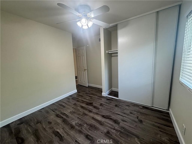 1881 Mitchell Ave Unit 34, Tustin, CA 92780 - unfurnished bedroom featuring dark wood-style flooring, a closet, baseboards, and a ceiling fan