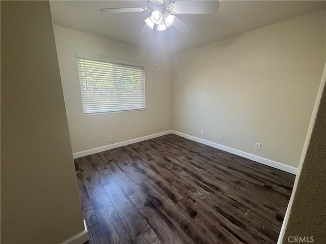 1881 Mitchell Ave Unit 34, Tustin, CA 92780 - spare room with dark wood-type flooring, a ceiling fan, and baseboards