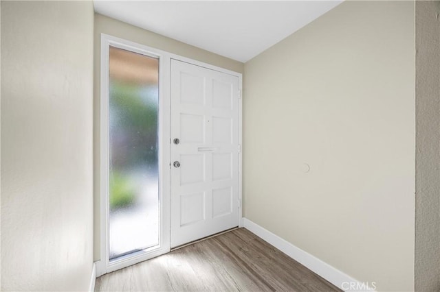 1881 Mitchell Ave Unit 34, Tustin, CA 92780 - entryway featuring wood finished floors and baseboards
