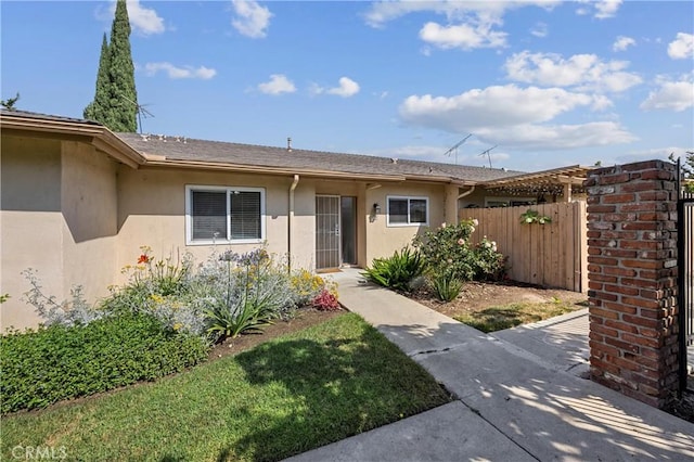 1881 Mitchell Ave Unit 34, Tustin, CA 92780 - view of front of house with stucco siding