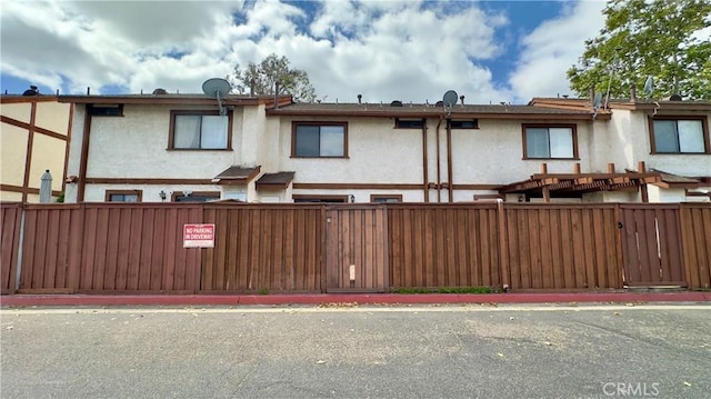 1133 S Paula Dr Unit 7, Fullerton, CA 92833 - view of front of house with stucco siding