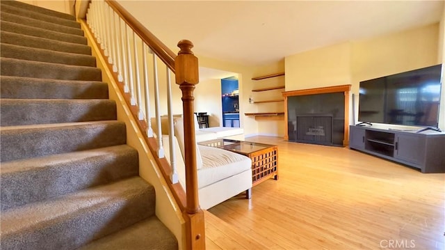 1133 S Paula Dr Unit 7, Fullerton, CA 92833 - living area featuring stairs and light wood-type flooring