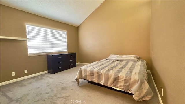 1133 S Paula Dr Unit 7, Fullerton, CA 92833 - bedroom featuring light colored carpet, baseboards, and vaulted ceiling