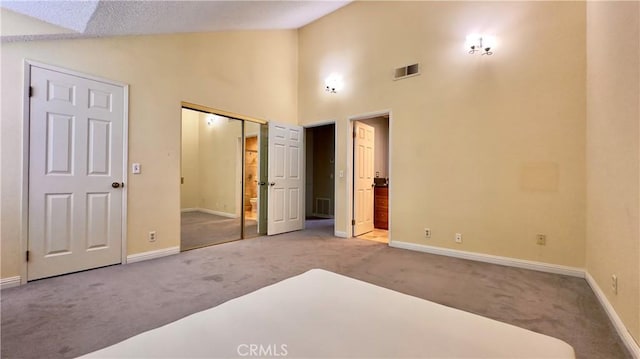 1133 S Paula Dr Unit 7, Fullerton, CA 92833 - unfurnished bedroom featuring carpet floors, baseboards, and high vaulted ceiling