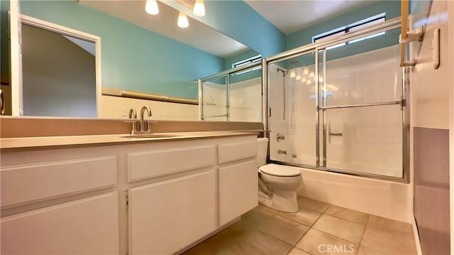1133 S Paula Dr Unit 7, Fullerton, CA 92833 - full bath featuring toilet, enclosed tub / shower combo, vanity, and tile patterned flooring