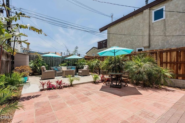 244 Cahuenga Dr, Oxnard, CA 93035 - fenced backyard with an outdoor hangout area, a patio, and outdoor dining area