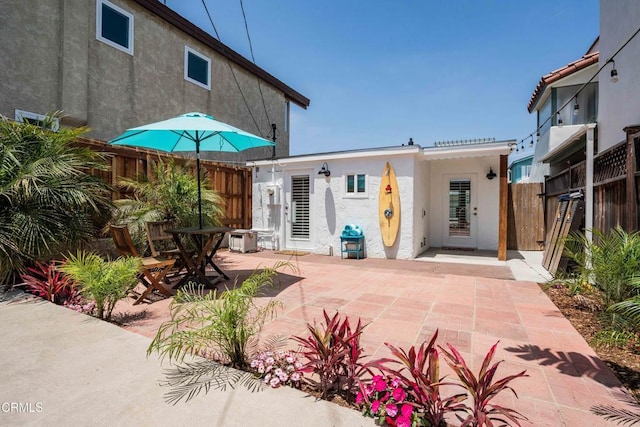 244 Cahuenga Dr, Oxnard, CA 93035 - back of property featuring stucco siding and a patio area