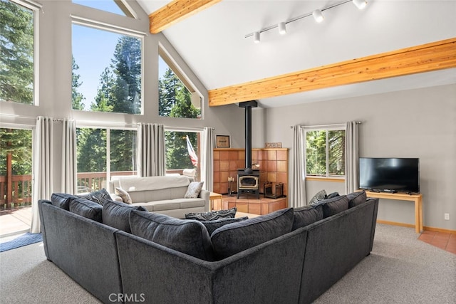 120 Top Of The W Dr, Chester, CA 96020 - living room featuring a wood stove, high vaulted ceiling, and beamed ceiling