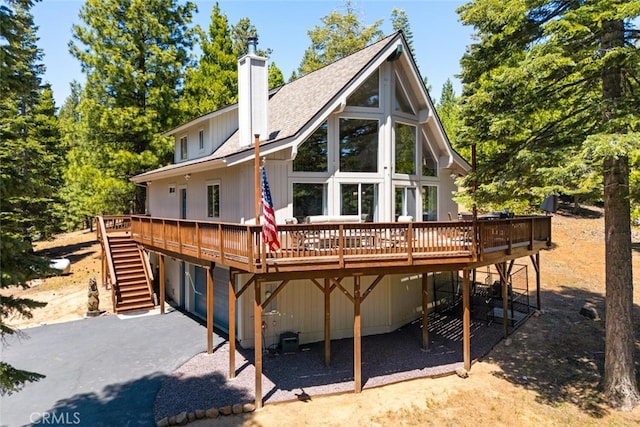 120 Top Of The W Dr, Chester, CA 96020 - back of house featuring a wooden deck, stairway, a chimney, and asphalt driveway