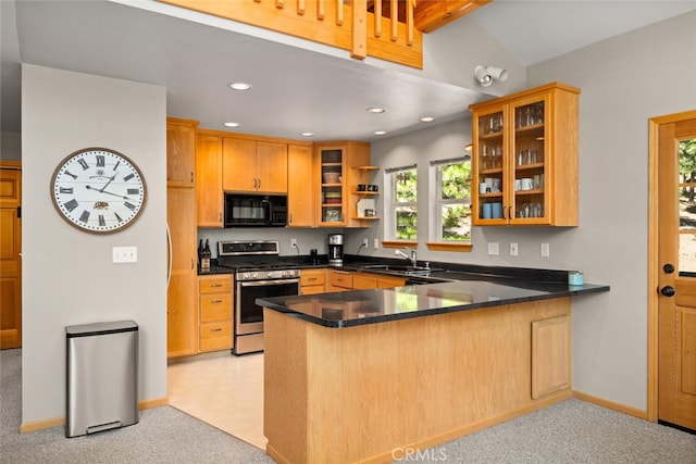 120 Top Of The W Dr, Chester, CA 96020 - kitchen featuring gas range, black microwave, a peninsula, a sink, and recessed lighting