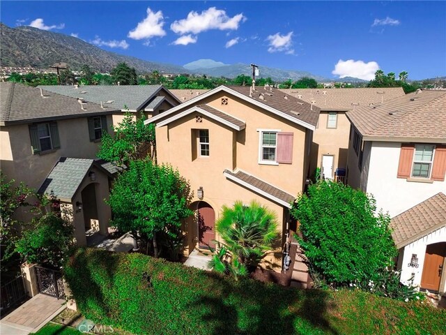 908 N Alameda Ave, Azusa, CA 91702 - view of front of home with a mountain view, stucco siding, and a residential view
