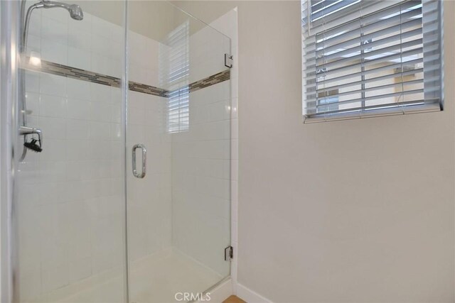 908 N Alameda Ave, Azusa, CA 91702 - bathroom with a stall shower and baseboards