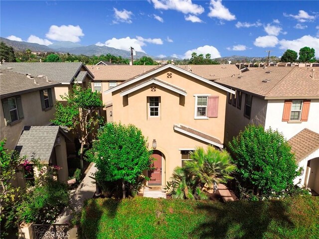 908 N Alameda Ave, Azusa, CA 91702 - view of front of property featuring stucco siding, a mountain view, and a residential view