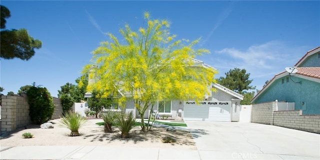 5515 Katrina Pl, Palmdale, CA 93552 - obstructed view of property with driveway and a garage