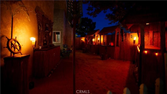 5515 Katrina Pl, Palmdale, CA 93552 - yard at night with a patio area