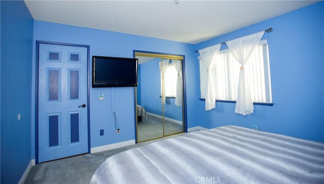5515 Katrina Pl, Palmdale, CA 93552 - unfurnished bedroom featuring carpet, a closet, and a textured ceiling
