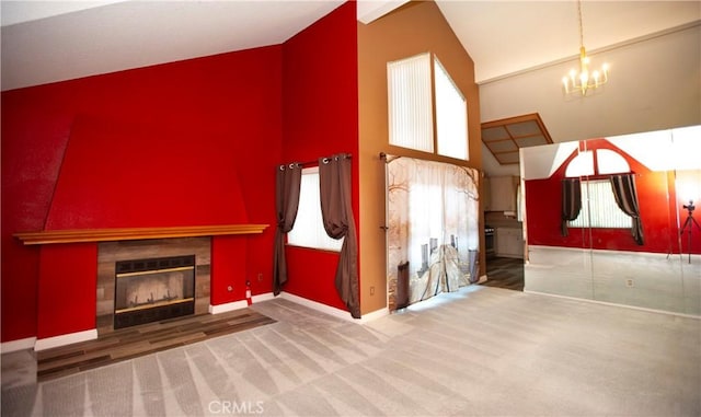 5515 Katrina Pl, Palmdale, CA 93552 - unfurnished living room with high vaulted ceiling, a tiled fireplace, a chandelier, and carpet flooring