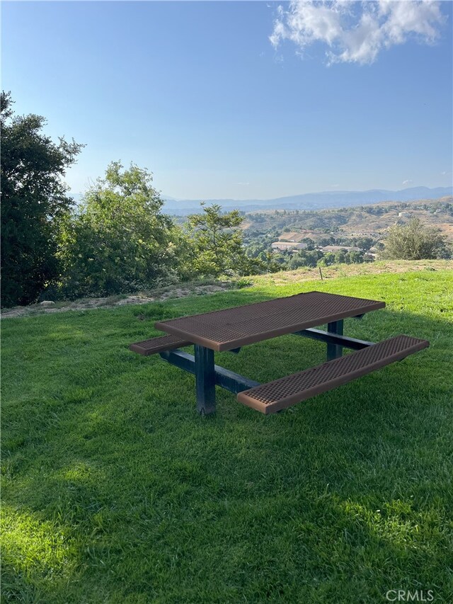 24420 Flaxwood Ln Unit 204, Newhall, CA 91321 - view of property's community featuring a lawn