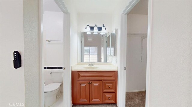 24420 Flaxwood Ln Unit 204, Newhall, CA 91321 - bathroom with toilet and vanity