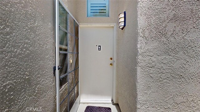 24420 Flaxwood Ln Unit 204, Newhall, CA 91321 - entrance to property with stucco siding