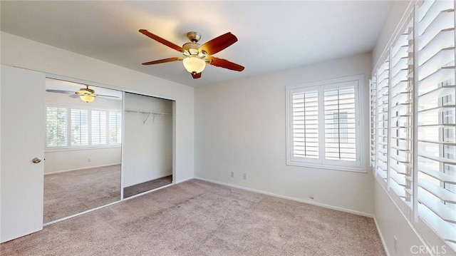 24420 Flaxwood Ln Unit 204, Newhall, CA 91321 - unfurnished bedroom featuring carpet floors, a closet, ceiling fan, and baseboards