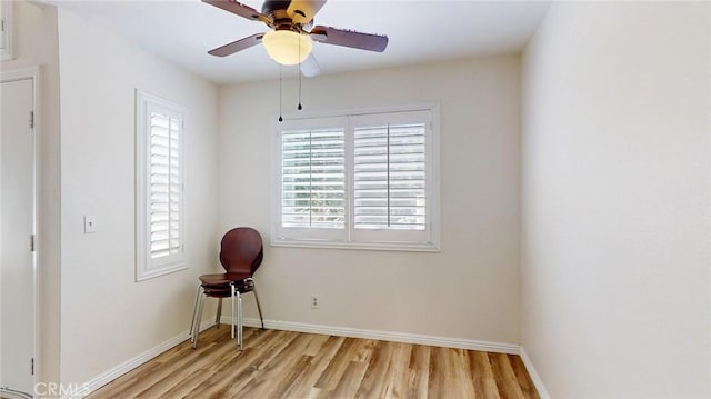 24420 Flaxwood Ln Unit 204, Newhall, CA 91321 - spare room with light wood-style floors, baseboards, and a ceiling fan
