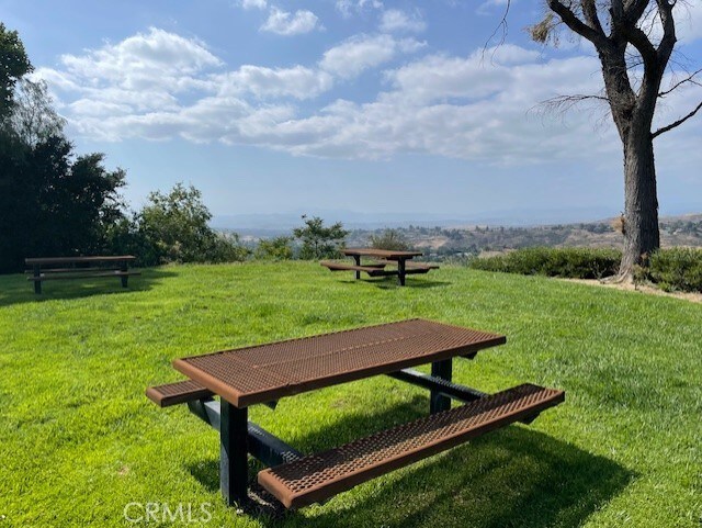 24420 Flaxwood Ln Unit 204, Newhall, CA 91321 - view of property's community featuring a lawn