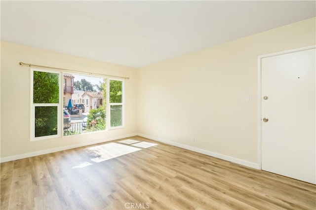 159 Roycroft Ave, Long Beach, CA 90803 - spare room featuring wood finished floors and baseboards