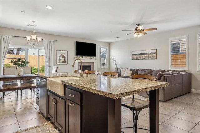 255 Waterfall Rd, Templeton, CA 93465 - kitchen with a sink, stainless steel dishwasher, open floor plan, light tile patterned flooring, and ceiling fan