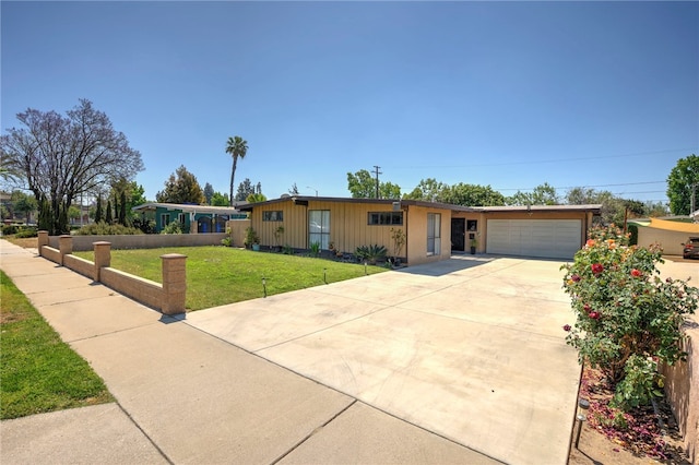 1111 W Berkeley Ct, Ontario, CA 91762 - single story home with a front yard, concrete driveway, and an attached garage