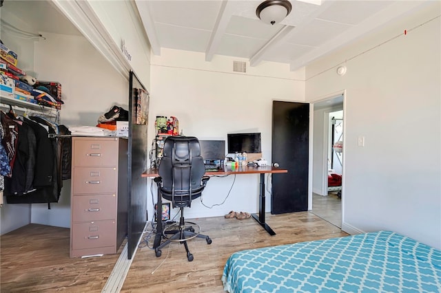 1111 W Berkeley Ct, Ontario, CA 91762 - bedroom with wood finished floors, a desk, and beam ceiling