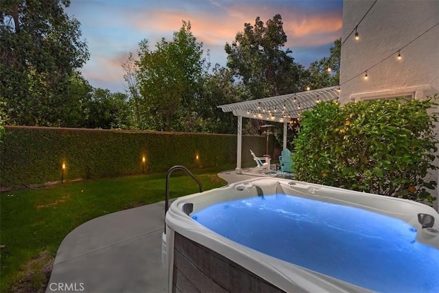 19 Laurelhurst Dr, Ladera Ranch, CA 92694 - pool at dusk featuring a hot tub, a patio area, and a pergola