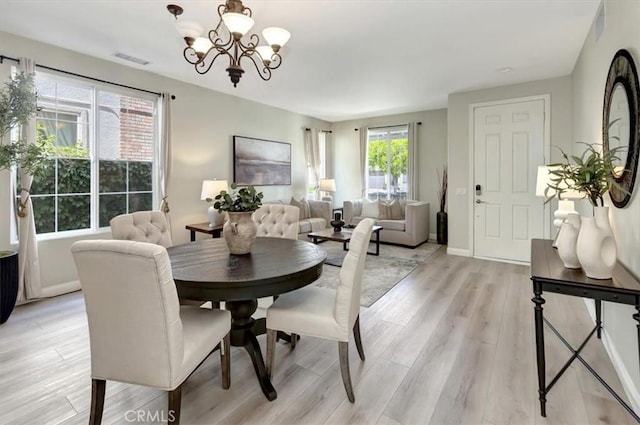 19 Laurelhurst Dr, Ladera Ranch, CA 92694 - dining room featuring a chandelier and light wood-type flooring