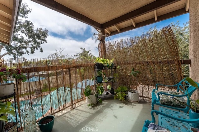 1520 Downs St, Oceanside, CA 92054 - balcony with view of pool area and a patio