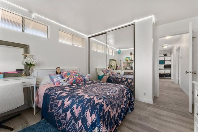 1520 Downs St, Oceanside, CA 92054 - bedroom featuring wood finished floors and a closet
