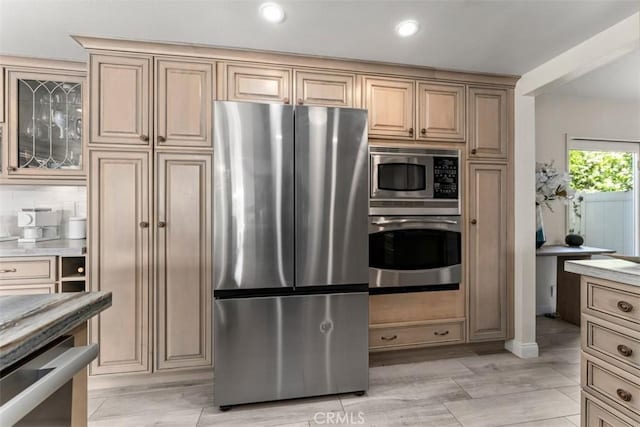 1520 Downs St, Oceanside, CA 92054 - kitchen featuring stainless steel appliances, light countertops, recessed lighting, and glass insert cabinets
