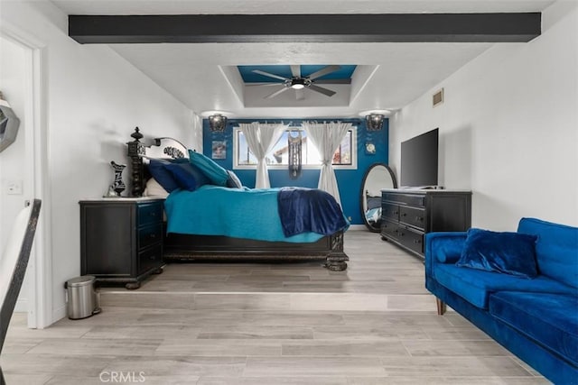 1520 Downs St, Oceanside, CA 92054 - bedroom with a tray ceiling, light wood-style floors, a ceiling fan, and baseboards