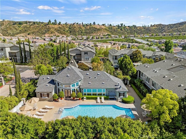 20000 Plum Canyon Rd Unit 1326, Saugus, CA 91350 - aerial perspective of suburban area with a pool and mountains