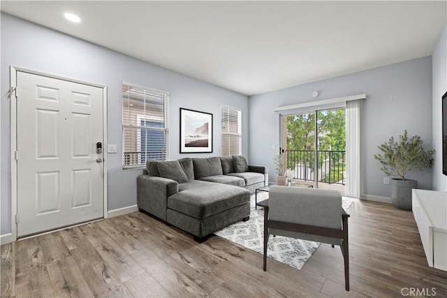 20000 Plum Canyon Rd Unit 1326, Saugus, CA 91350 - living area with wood finished floors, baseboards, and recessed lighting