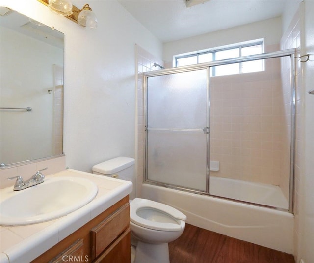 3819 W 190th St, Torrance, CA 90504 - full bath featuring toilet, vanity, bath / shower combo with glass door, and wood finished floors