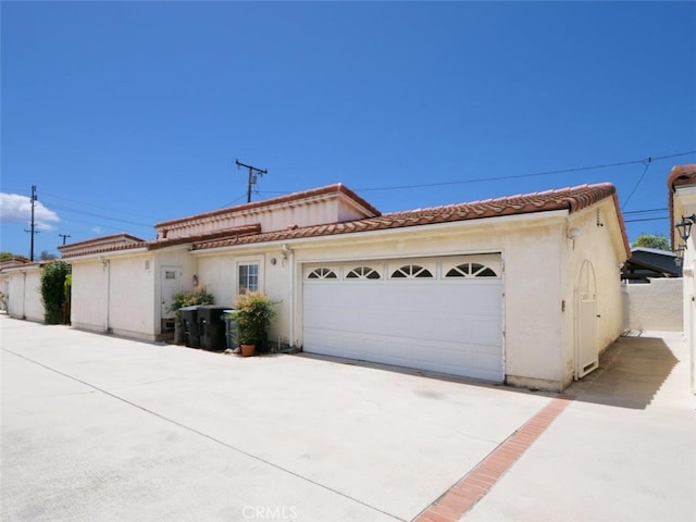 3819 W 190th St, Torrance, CA 90504 - mediterranean / spanish-style home featuring a tiled roof, stucco siding, and a garage