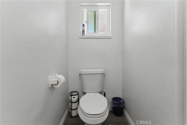 1089 E Columbia Ave, Pomona, CA 91767 - bathroom with baseboards and toilet