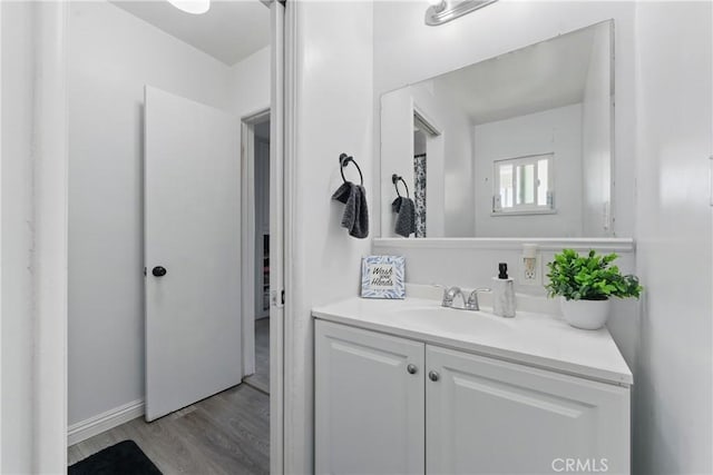 1089 E Columbia Ave, Pomona, CA 91767 - bathroom with vanity and wood finished floors