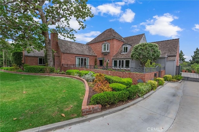 4275 Country Club Dr, Long Beach, CA 90807 - view of front of property featuring brick siding and a chimney