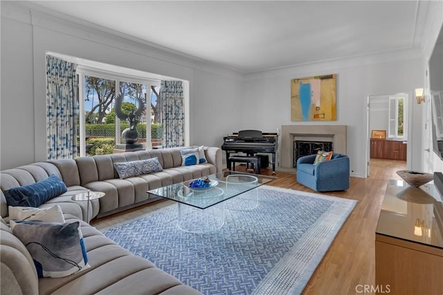 4275 Country Club Dr, Long Beach, CA 90807 - living room with crown molding, light wood finished floors, and a fireplace