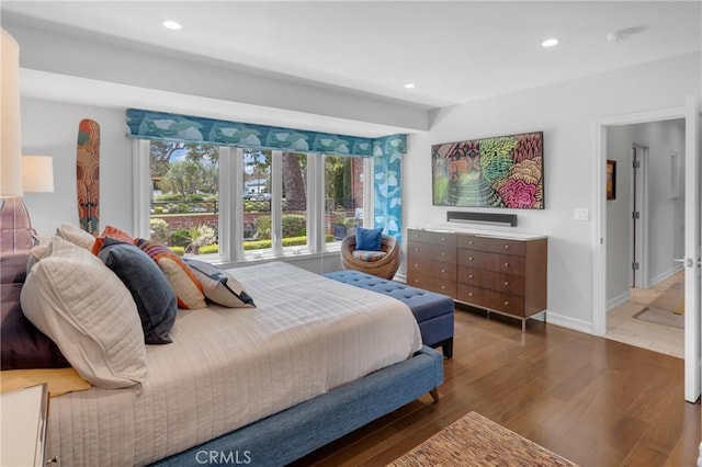 4275 Country Club Dr, Long Beach, CA 90807 - bedroom featuring recessed lighting, wood finished floors, and baseboards