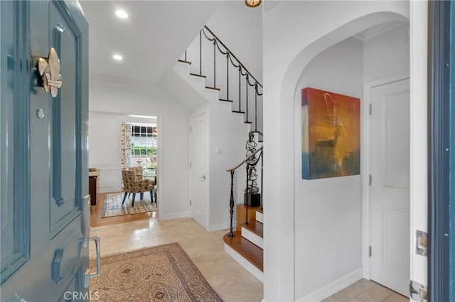 4275 Country Club Dr, Long Beach, CA 90807 - foyer entrance featuring arched walkways, stairway, recessed lighting, and baseboards