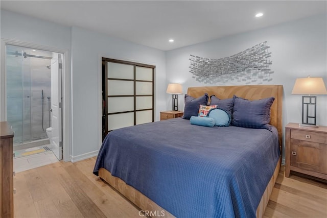 4275 Country Club Dr, Long Beach, CA 90807 - bedroom with light wood-style floors, recessed lighting, connected bathroom, and baseboards