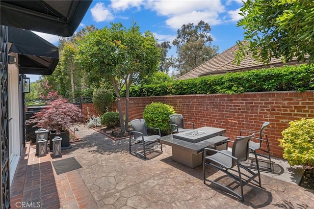 4275 Country Club Dr, Long Beach, CA 90807 - view of patio with an outdoor fire pit