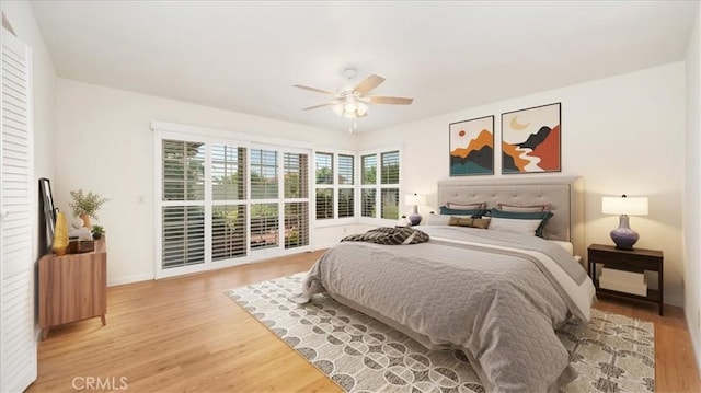1589 Palomino Ave, Upland, CA 91786 - bedroom with light wood-type flooring, baseboards, and a ceiling fan